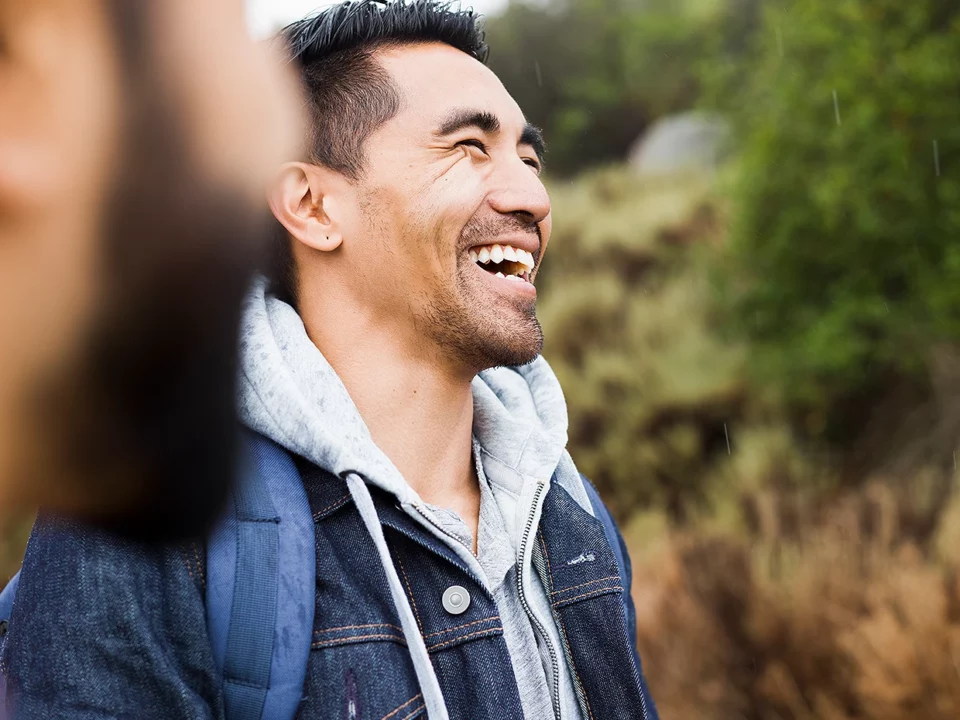 Friendly neighborhood general dentistry team member smiling outdoors